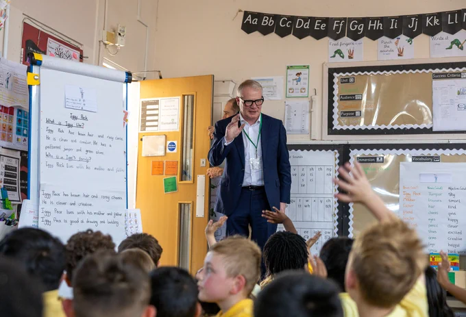 Richard Parker meets pupils at Corngreaves Academy.