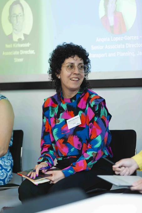 Angela Lopez-Garces speaking at the conference