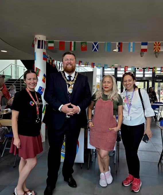 Mayor of St Helens Borough, Cllr Seve Gomez-Aspron, pictured with services at St Helens College Refugee Week event
