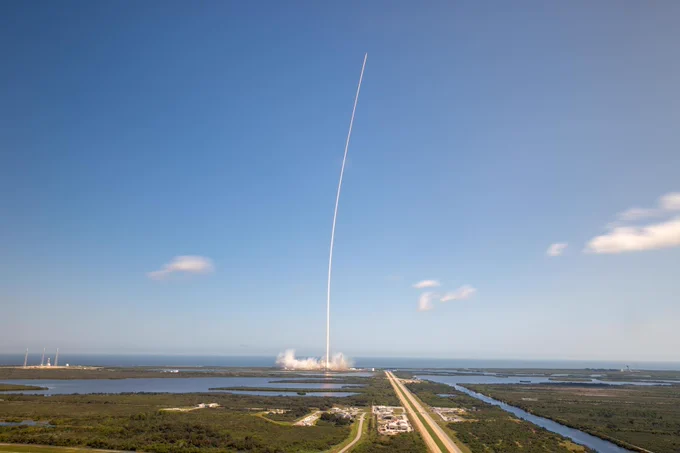 Extreme wide shot of a SpaceX Falcon Heavy rocket carrying NASA’s Europa Clipper spacecraft as it lifts off from Launch Complex 39A at NASA’s Kennedy Space Center in Florida on Oct. 14, 2024.