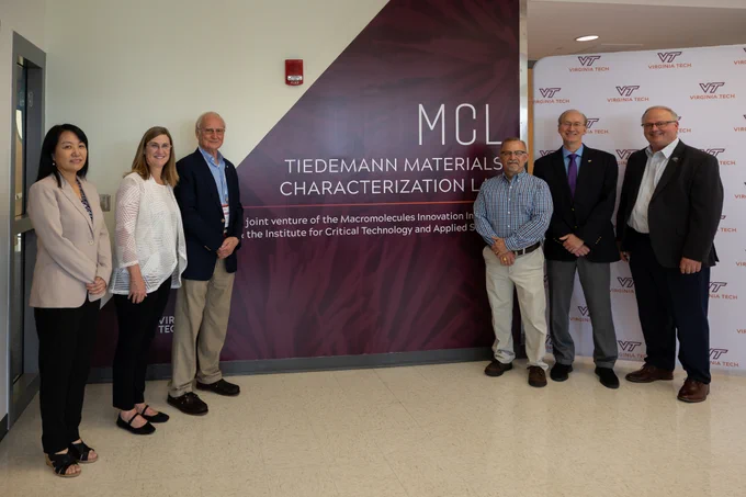 From left: Virginia Tech ECE department head Rose Hu, College of Engineering Dean Julie Ross, Ed Tiedemann, two Virginia Tech engineering members, and Institute for Critical Technology and Applied Science director Stefan Duma.