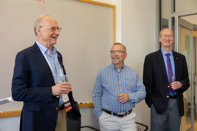 Virginia Tech ECE alum Ed Tiedemann smiles during the presentation about the lab named after him.
