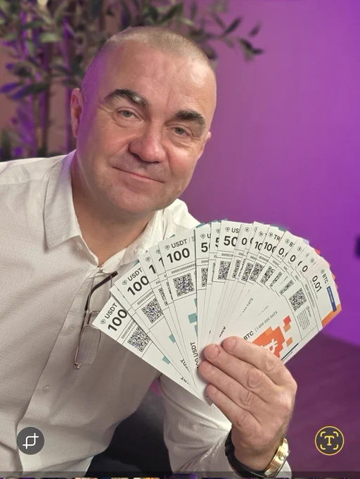 Alex holding a stack of softnote bills fanned out.