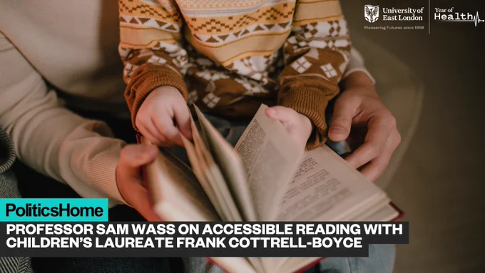 A child sitting on an adults lap reading a book together. Text reads 'PoliticsHome: professor sam wass on accessible reading with Children’s Laureate Frank Cottrell-Boyce'.