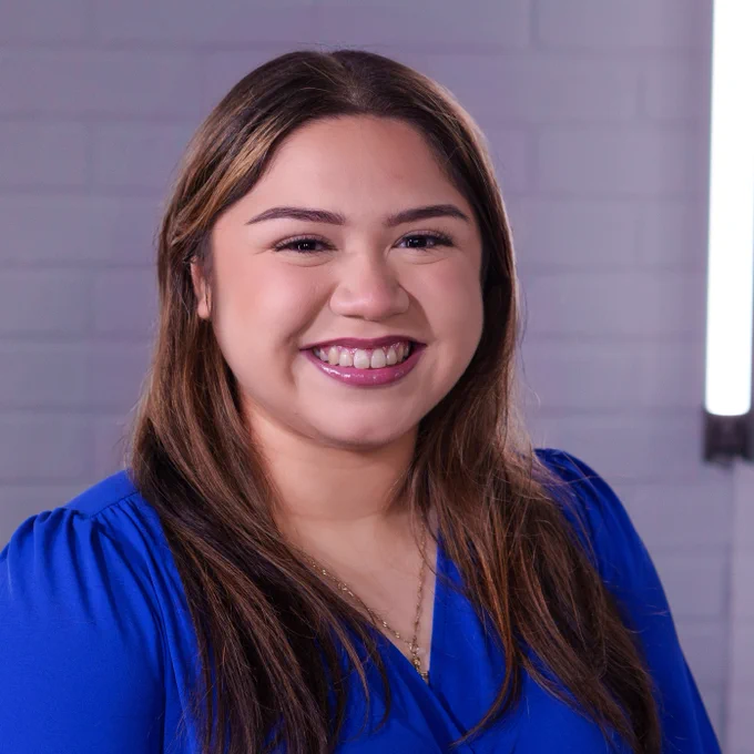 Adrianna Gauna, the 2025 District Rookie of the Year and a proud Tyler High School teacher, smiles on the Talks With Tyler ISD podcast set.