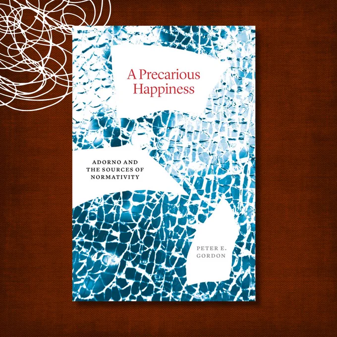 The cover of the book A Precarious Happiness: Adorno and the Sources of Normativity by Peter E. Gordon. The title appears in red on a torn paper-like shape. The subtitle and author's name are printed on additional white, shard-shaped areas, all placed over a background resembling shattered blue glass or ice. The same brown textured background and white looping design from the first image frame the book cover.