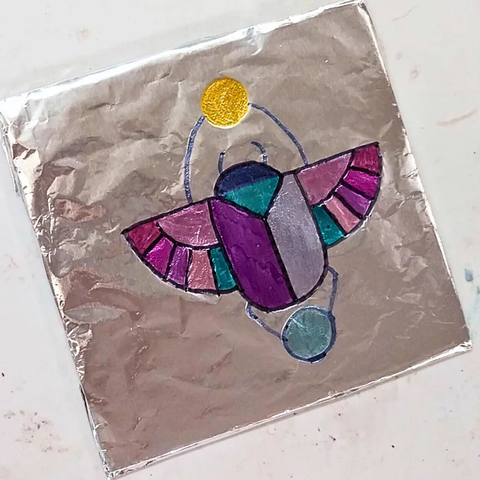 Photograph of scarab beetle craft. 