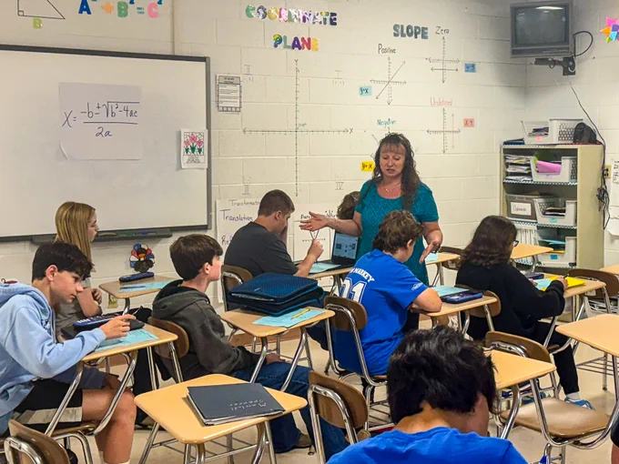 Wolfe County Middle School Teacher Sally Hurt teaches a class of math students. She is a teacher leader in the district, helping align curriculum across the district’s schools.