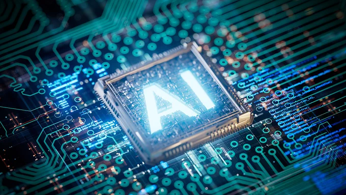 A computer chip with AI written on it.