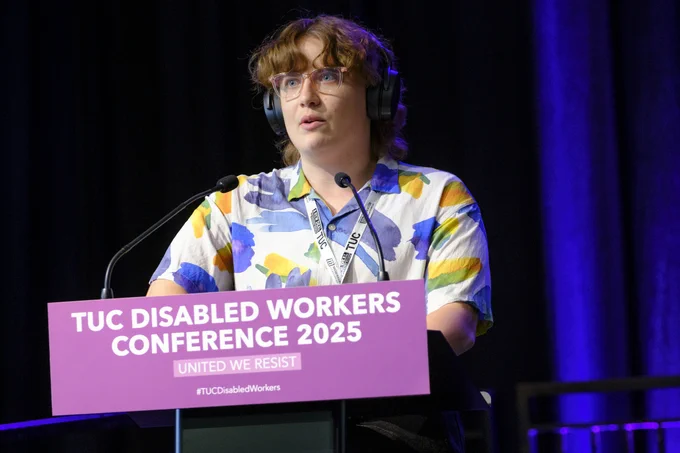 Photo of Jas speaking to the delegation - Photo by Jess Hurd