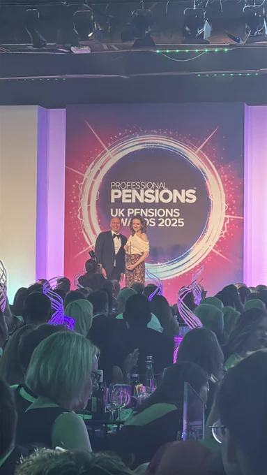 Caroline Escott collecting an award on behalf of Railpen