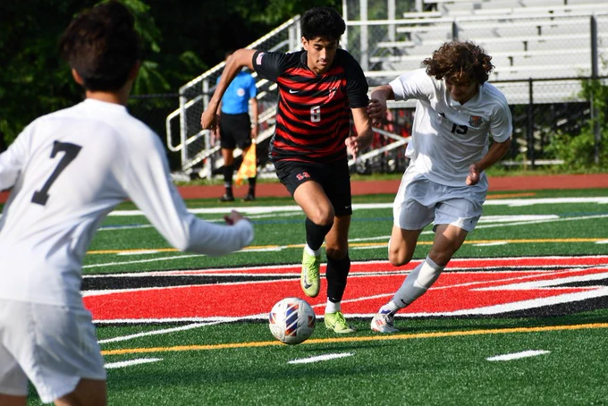 Boys playing soccer