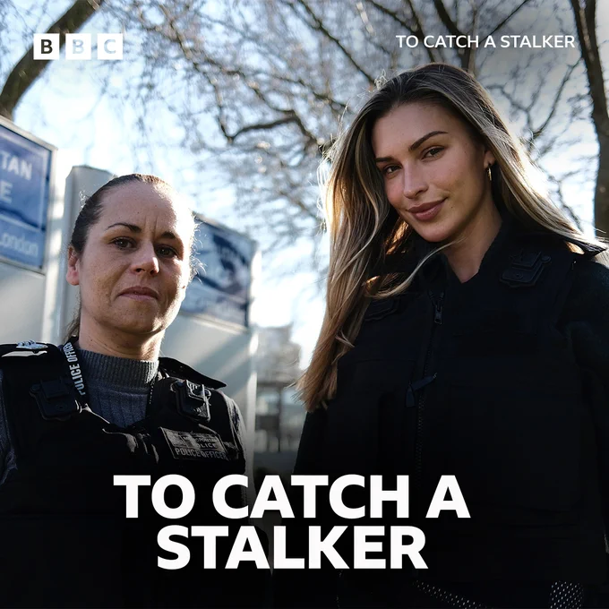 Two individuals, one in a police uniform and the other in a black jacket, stand outdoors. The background shows trees and a partially visible sign. The image features the BBC logo in the top left corner and the text 'TO CATCH A STALKER' at the bottom centre and top right corner in white font.