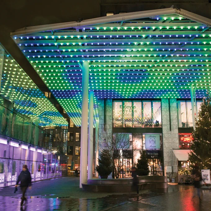 And of course we can't leave without a souvenir so let's head over to the Emmasingel shopping district in Eindhoven, The Netherlands! The Admirant Canopy is a 750-square meter glass canopy installed to shield shoppers from the bitter winds and also serves as a unique opportunity for an interactive light art installation that would beautify the area!

