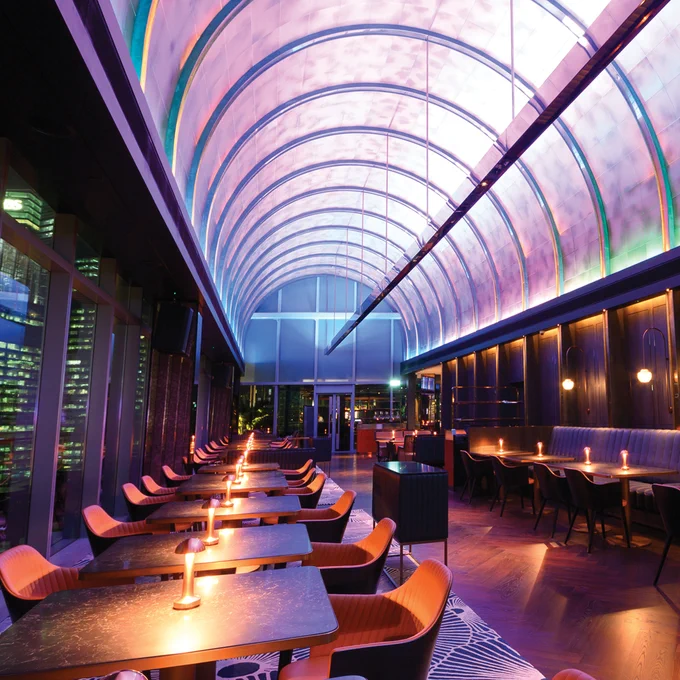 Next we'll head over to OUE Bayfront, Singapore for a bite in the trendy VUE Restaurant! The lighting design creates sets the mood with dynamic color, a range of color temperatures and dimming levels, as well as indirect light distribution to illuminate the unique ceiling!
