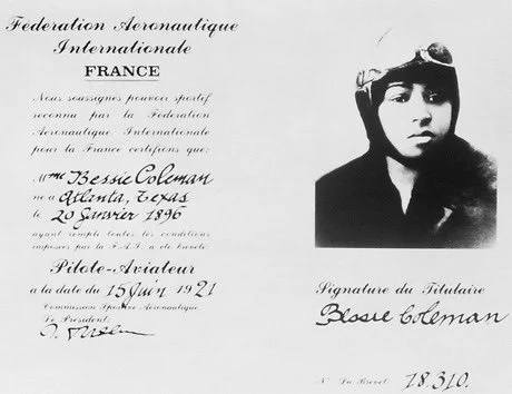 Black-and-white photo of Bessie Coleman wearing a leather cap and goggles. Below the photo is a document in French stating her pilot certification, with her signature at the bottom.