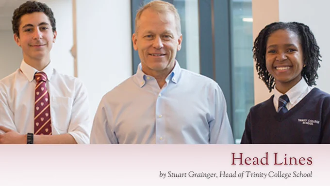 The visual contains the text "Head Lines by Stuart Grainer, Head of Trinity College School". The visual contains a photograph of Stuart Grainger and two students.