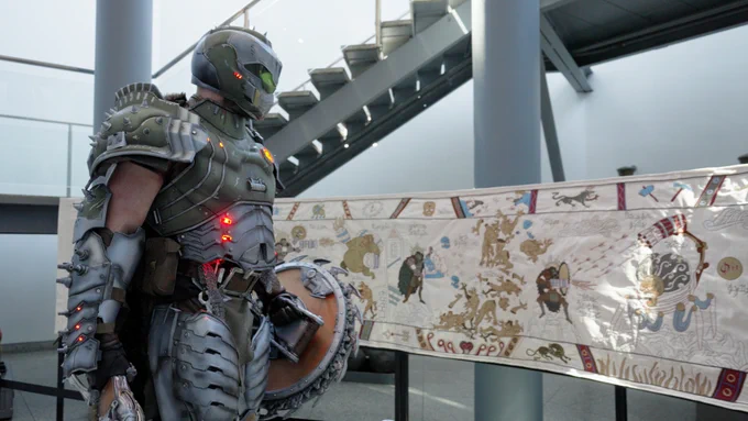 DOOM Slayer looking at the full scale Slayeux Tapestry. 