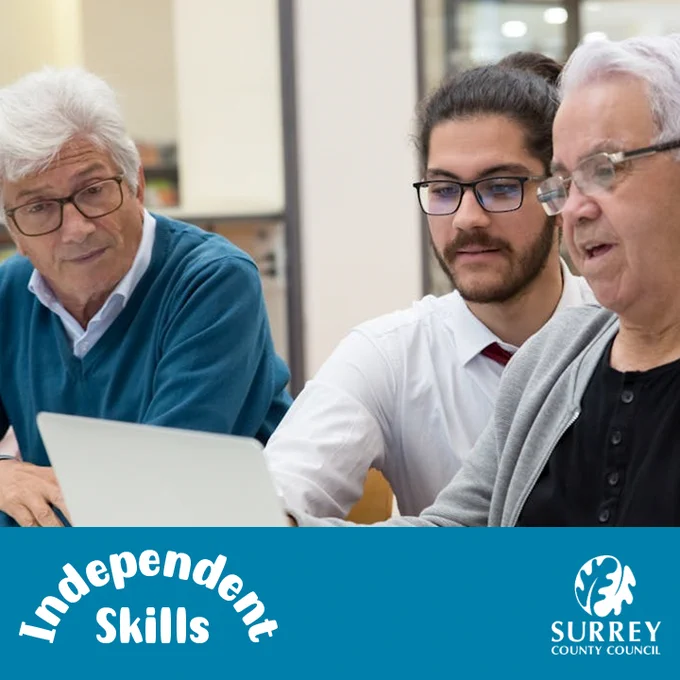 Surrey Libraries Independents Skills courses promotional card - photo of three men of various ages sat at a desk and looking at a computer screen. In the bottom part of the images is a blue banner with the Independent Skills project logo and Surrey County Council's logo.
