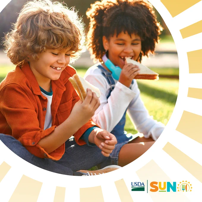 A graphic tile with two kids eating sandwiches. 
USDA logo and SUN logo at the bottom right. 