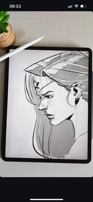 A profile sketch of Wonder Woman’s face on an iPad.