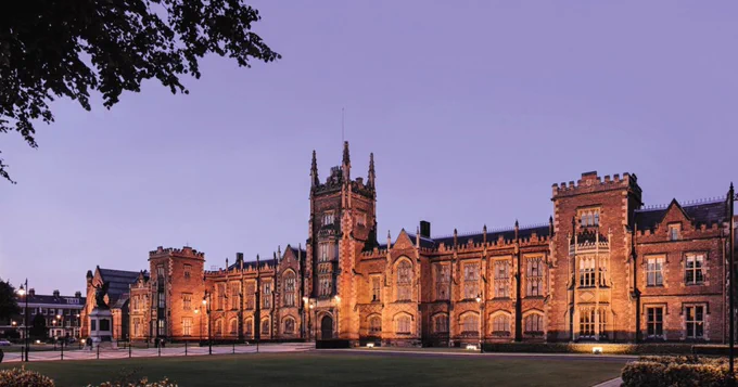 Image shows the Lanyon building lit up at night.