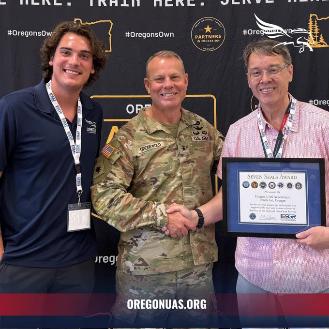 Joseph Wyno, Executive Director, and Andrew Wolotira, Operations Manager of the Oregon UAS Accelerator, pictured with Brigadier General Alan R. Gronewold, The Adjutant General of the Oregon National Guard, at the ORNG Labor Summit 2025.
