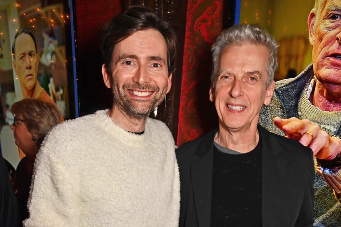 David Tennant and Peter Capaldi smiling at a public event.