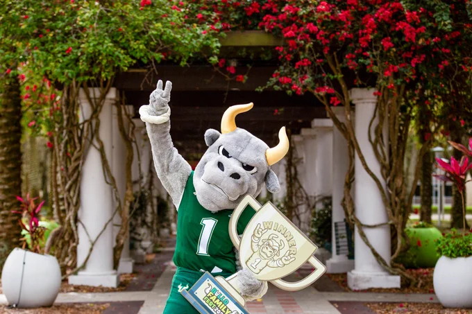 Rocky D. Bull holding a trophy