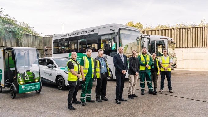 Staff stood in front of Islington's electric vehicles