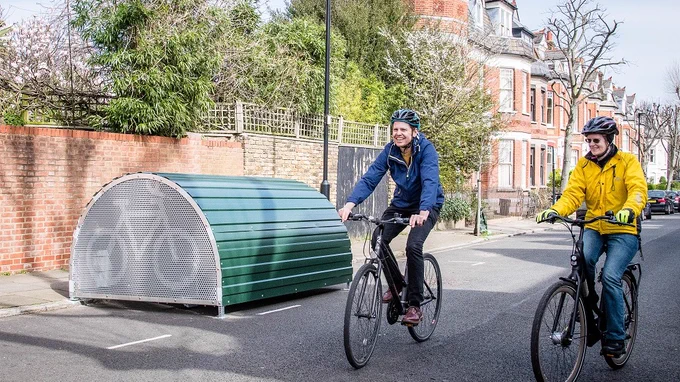 Two people cycling in Islington