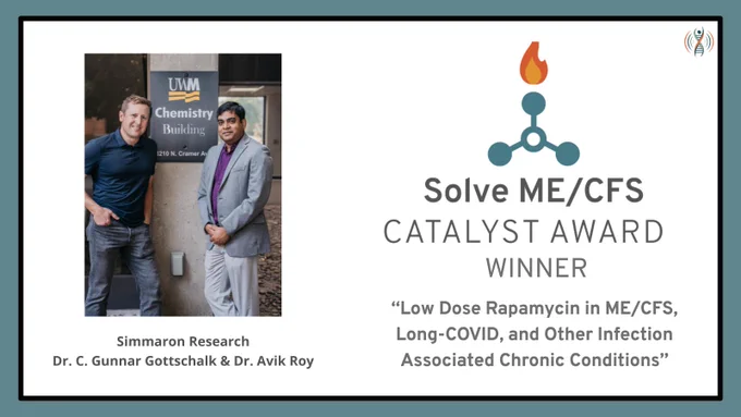 Pictured are two researchers from Simmaron Research:  Dr. C. Gunnar Gottschalk (blonde hair, blue shirt, blue pants) and Dr. Avik Roy (black hair, blue jacket, grey pants). The graphic depicts a blue three-pronged shape with an orange and yellow flame emerging from the top prong.  The text reads "Solve ME/CFS Catalyst Award Winner -- "Low Dose Rapamycin in ME/CFS, Long-COVID, and Other Infection Associated Chronic Conditions.”