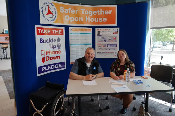 A Wisconsin DOT welcome table at the Safety Open House event inside the Hill Farms State Office building.