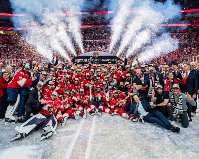 The Florida Panthers pose for a team photo with the Stanley Cup. 
