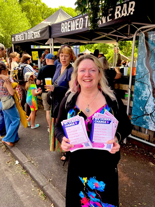 Mary Page It’s Our City Bristol, holding We Demand Change leaflets for event on 22nd June at Malcolm X.