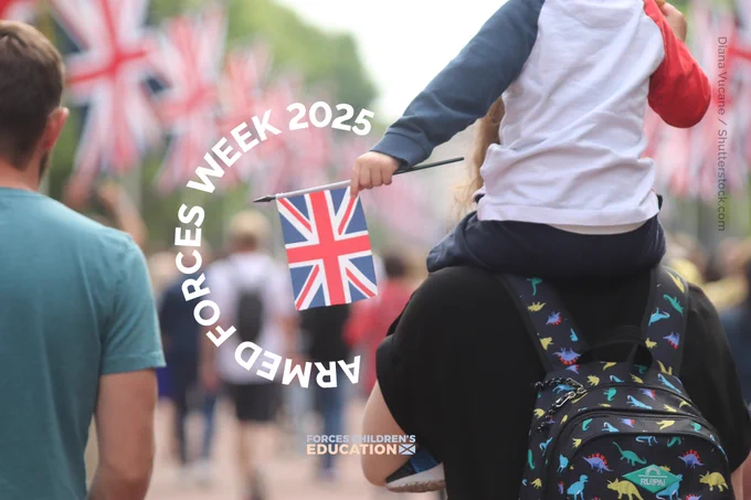A child holding a flag sits on top of an adult's shoulders as they look towards an outdoor celebration. Around the flag is the text Armed Forces Week 2025.