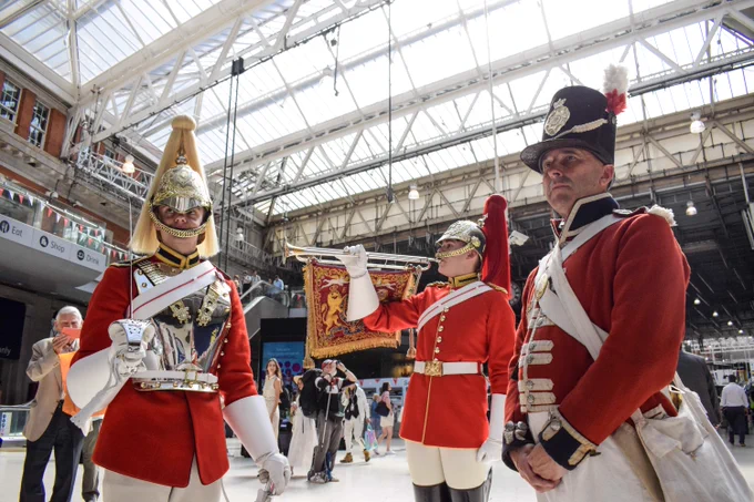 Image shows London Waterloo and Life Guards Tpr Barlow and Tpr Davis with 1815 Coldstream Guards reenactor Anthony.