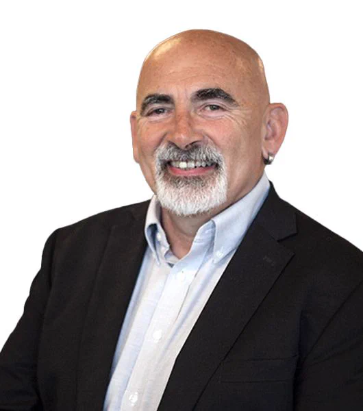 Headshot of author Dylan Wiliam smiling at the camera.