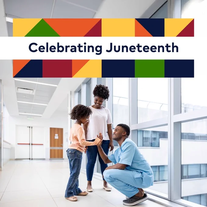 A smiling man in scrubs high-fives a child in a healthcare setting with, ‘Celebrating Juneteenth’
