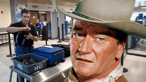 John Wayne with a man at the checkpoint getting his stuff ready to go through x-ray screening as a background.
