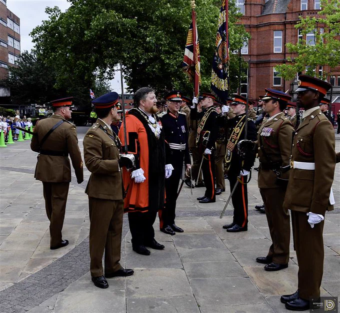 Mayor of St Helens Borough Cllr Seve Gomez-Aspron speaking with members of the Duke of Lancaster Regiment in Victoria Square