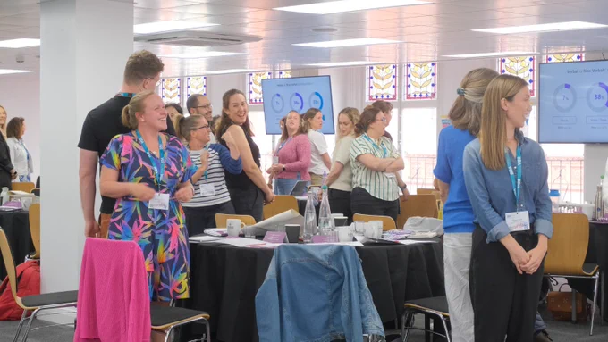 Photo of BDA volunteers and staff taking part in a communications skill building workshop.