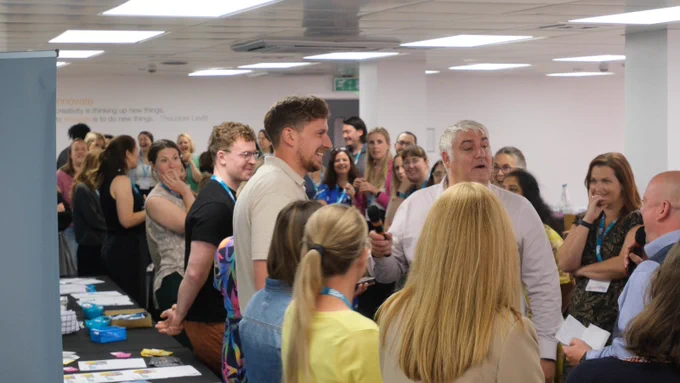 Photo of BDA volunteers and staff taking part in a communications skill building workshop.