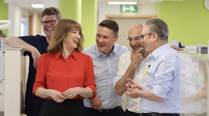 Rachel, Wes and Keir with NHS staff in Stratford
