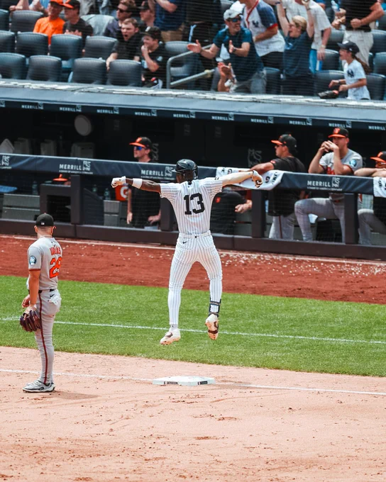 Jazz Chisholm jumps after hitting a 2-RBI Triple. 