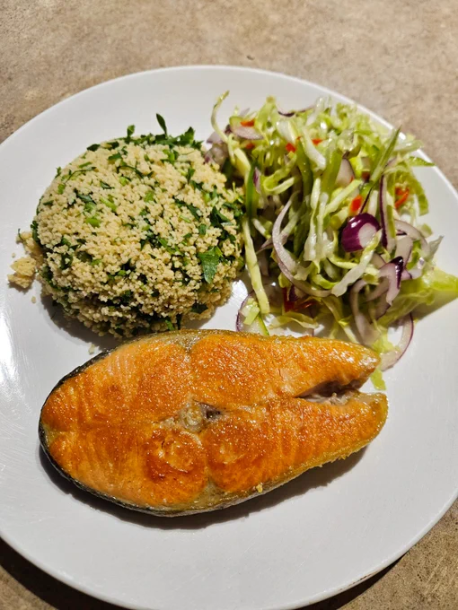 Dinner as described served on a round white plate.