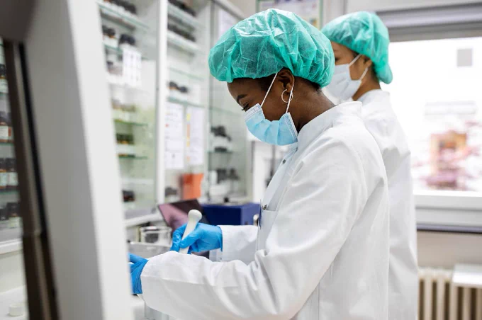 Two researchers working in a lab.