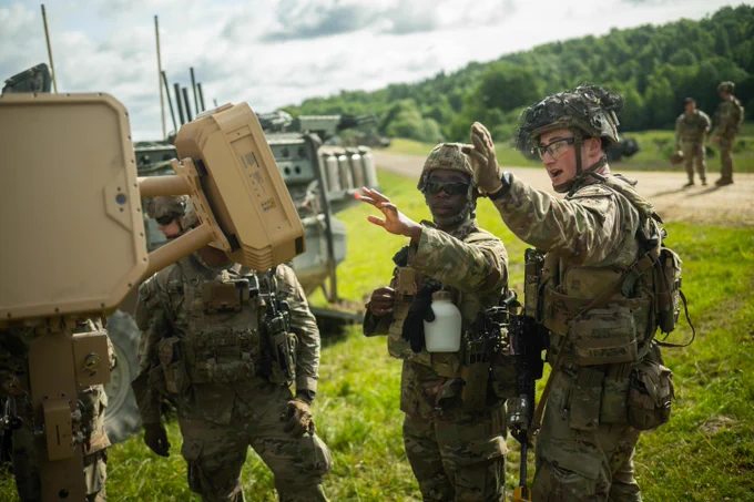 A U.S. Soldier directs his Soldiers on the establishment of the EchoShield
