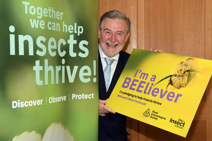 Barry Gardiner MP (Labour, Brent West) holding the Insect Week Pledge