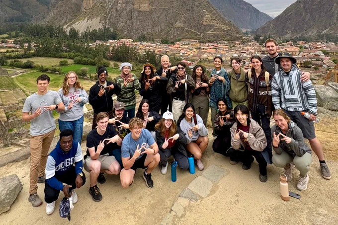 Virginia Tech electrical and computer engineering students pose for a picture in Peru.